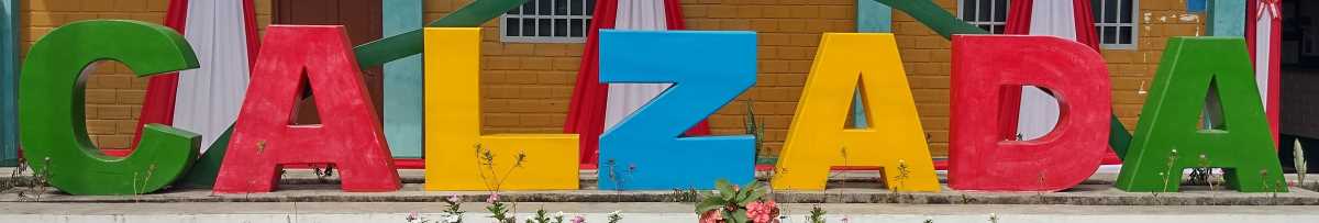 calzada-sign.jpg The Calzada city-name sign is in the Plaza de Armas.