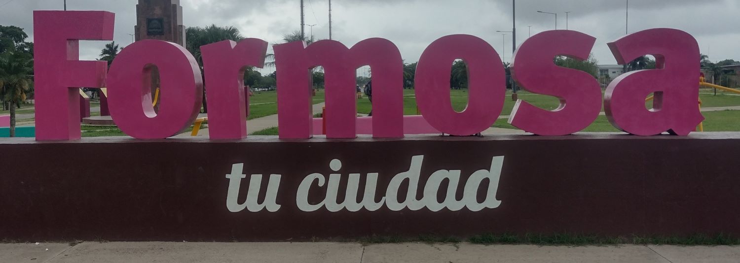 Encarnación sign along the waterfront, costañera, across from the Super Seis supermarket.