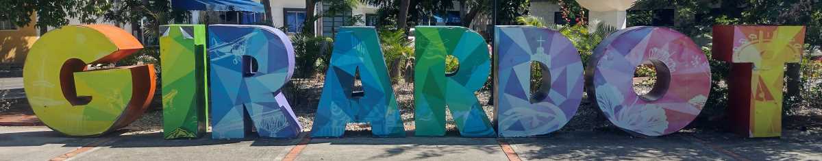 girardot-sign.jpg This city name sign in across the street from the bus terminal. there is another one, much smaller, in the main city center plaza.