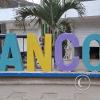 Mancora city name sign on Pan-Am Hwy at Parque San Pedro
