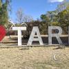 City name sign in Jardinera Las Americas