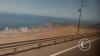 Iquique from the highway winding down the giant sand dune