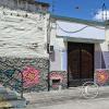Relief Mural on a house entry at Mariano Suarez Veintimilla