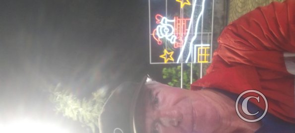 Me in front of Santa Claus display