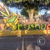 City name sign in median of Av Unidad Nacional near Av Policia Nacional (2)