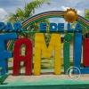 Parque de la Familia name sign on Av Eva Peron near Av 11 de Julio