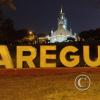 City name sign in front of the Catedral