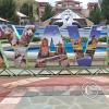 City name sign in the Parque Ciudad de los Ninos at end of Jiron Arequipa