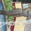 Statue of naked woman pouring water at Plazoleta Santa Teresa