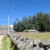 Old stone wall being protected by Ichu grass