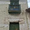 Jiron Bolivar and Jiron Canete-A carved wooden balcony, early 1800s