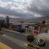 View north from the raised sidewalk on Av. Manuel Camilo de la Torre at Vallecito