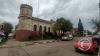 The building is the Police and Jail, built in 1891 at Calle 18 de Mayo y Av. Coronel Carlos Lecueder (2)